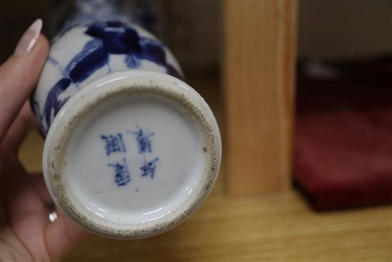 A 19th century Chinese blue and white ovoid jar, wood cover and two similar smaller vases tallest 15cm